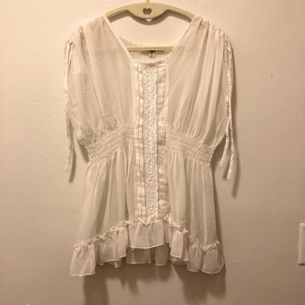Gorgeous top with lace and ruched shoulder accents. So pretty!